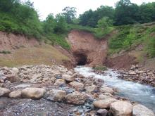 07 05 06 view of collapsed mine opening and damaged intake system after the june 27 29 2006 flooding